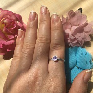 Silver-colored Ring with a Pink/Purple Gem